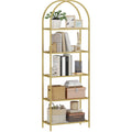 Bibliotheque design a cinq niveaux avec etageres en verre et structure arquee doree